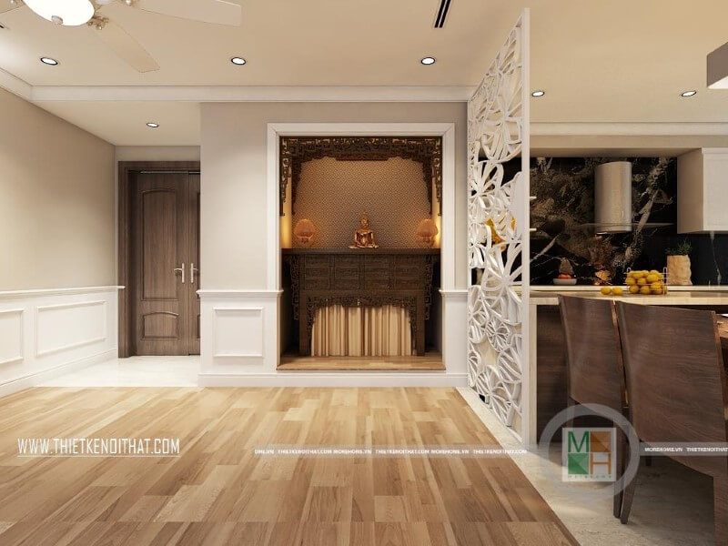 Thiết kế phòng thờ trang trọng với mẫu bàn thờ gỗ tự nhiên cao cấp cùng đường nét chạm khắc tinh tế, uyển chuyển theo phong cách tân cổ điển.